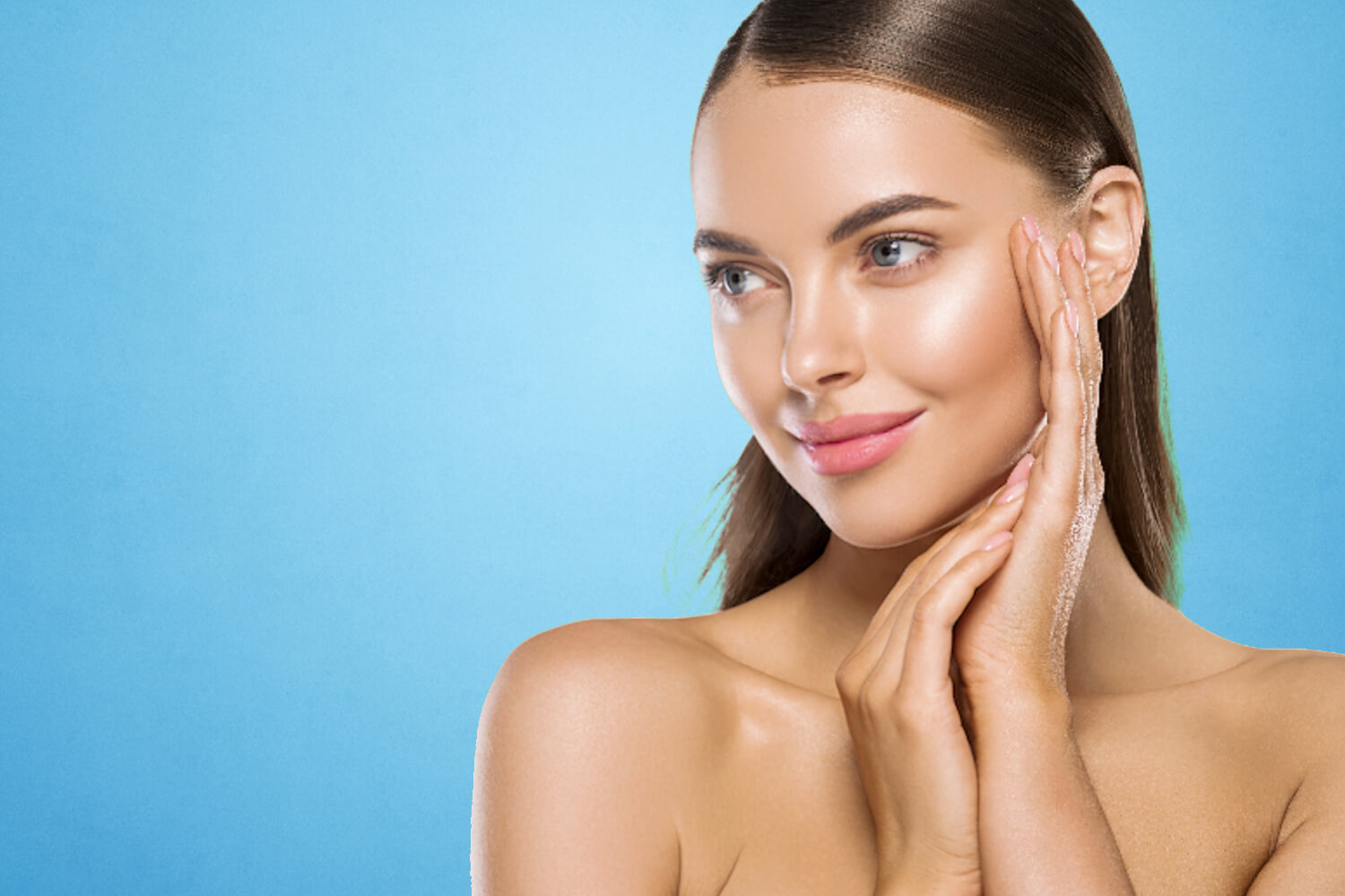 Woman with beautiful skin touches face