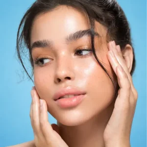 a female touching her face